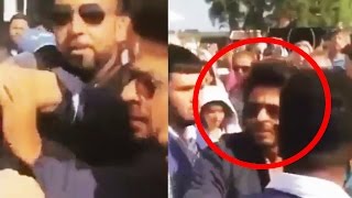 OMG Shahrukh Khan PUSHES amp HITS A Fan In Amsterdam [upl. by Dronel]